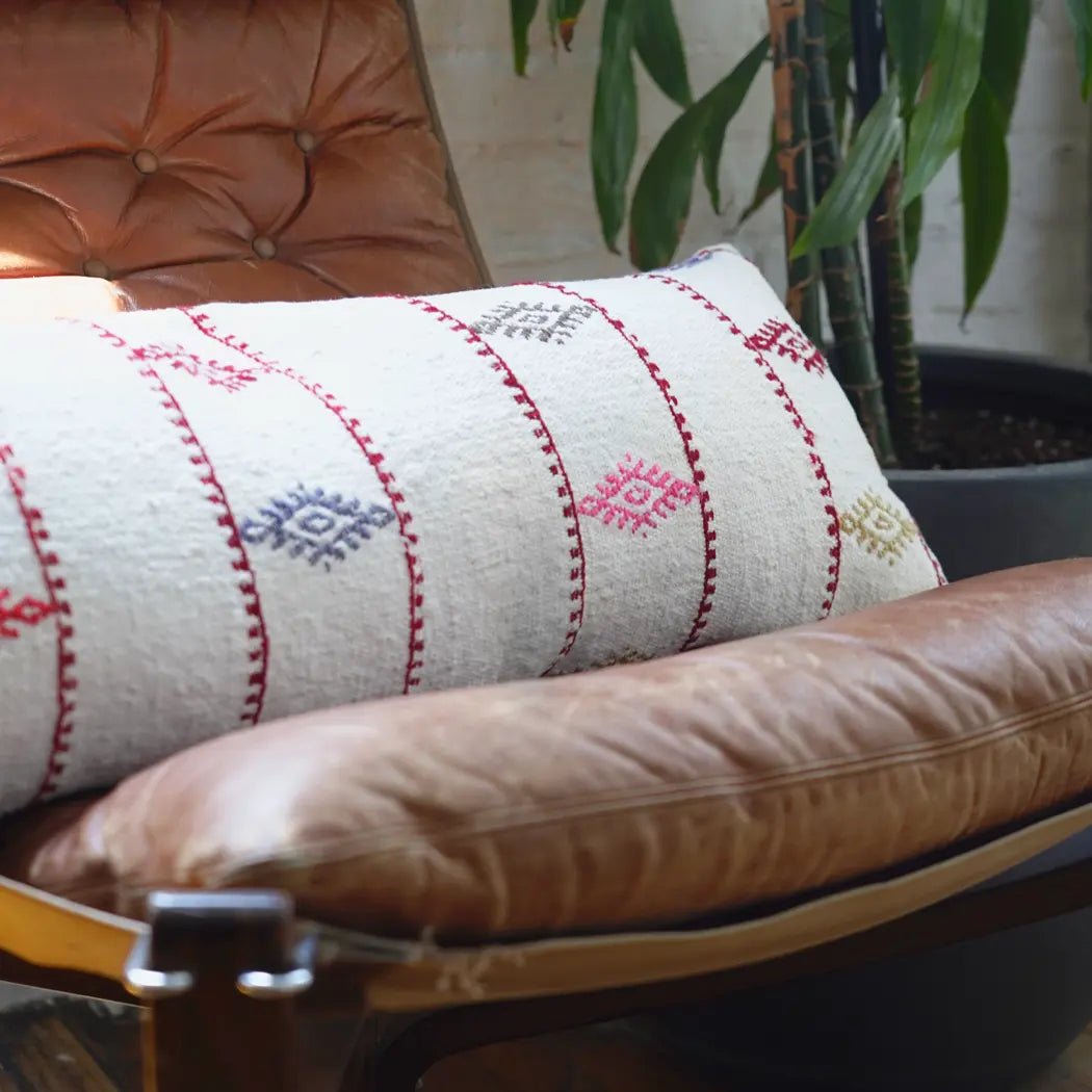 Textured White Throw Pillow With Pops of Color